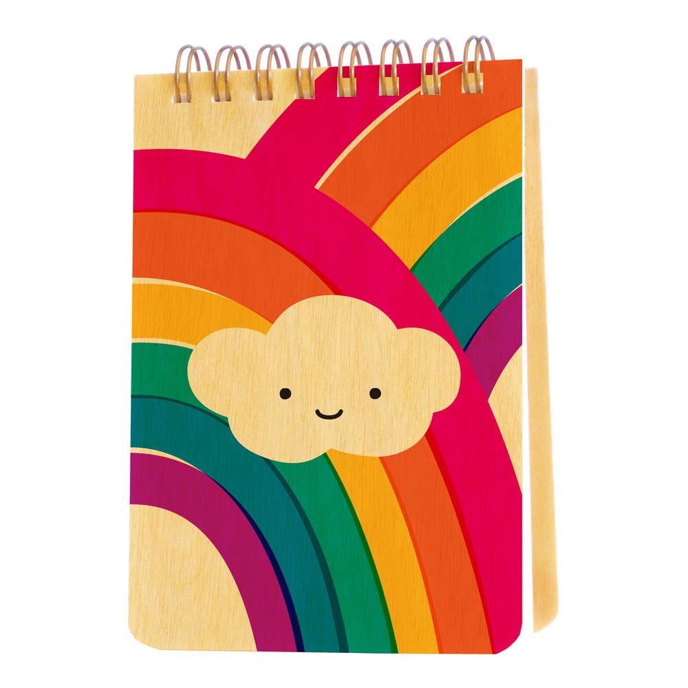 Notebook with a rainbow design and cloud face on a white background