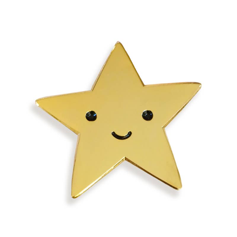 Gold star-shaped pin with a smiley face on a white background