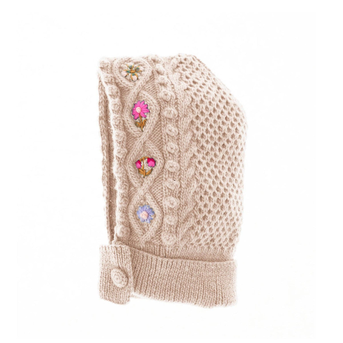Beige knitted baby blanket with colorful buttons on a white background