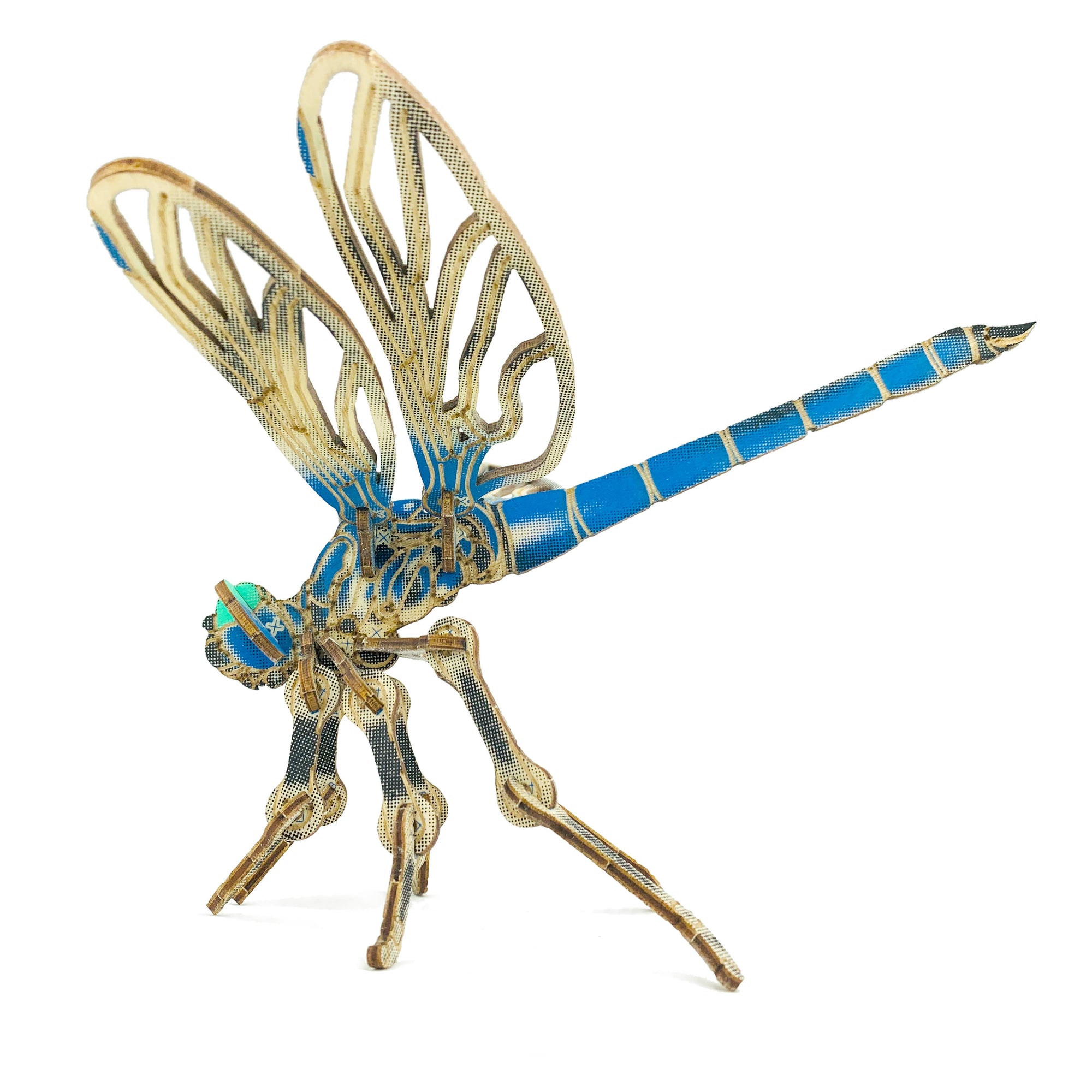 Decorative dragonfly figurine with gold and blue colors on a white background