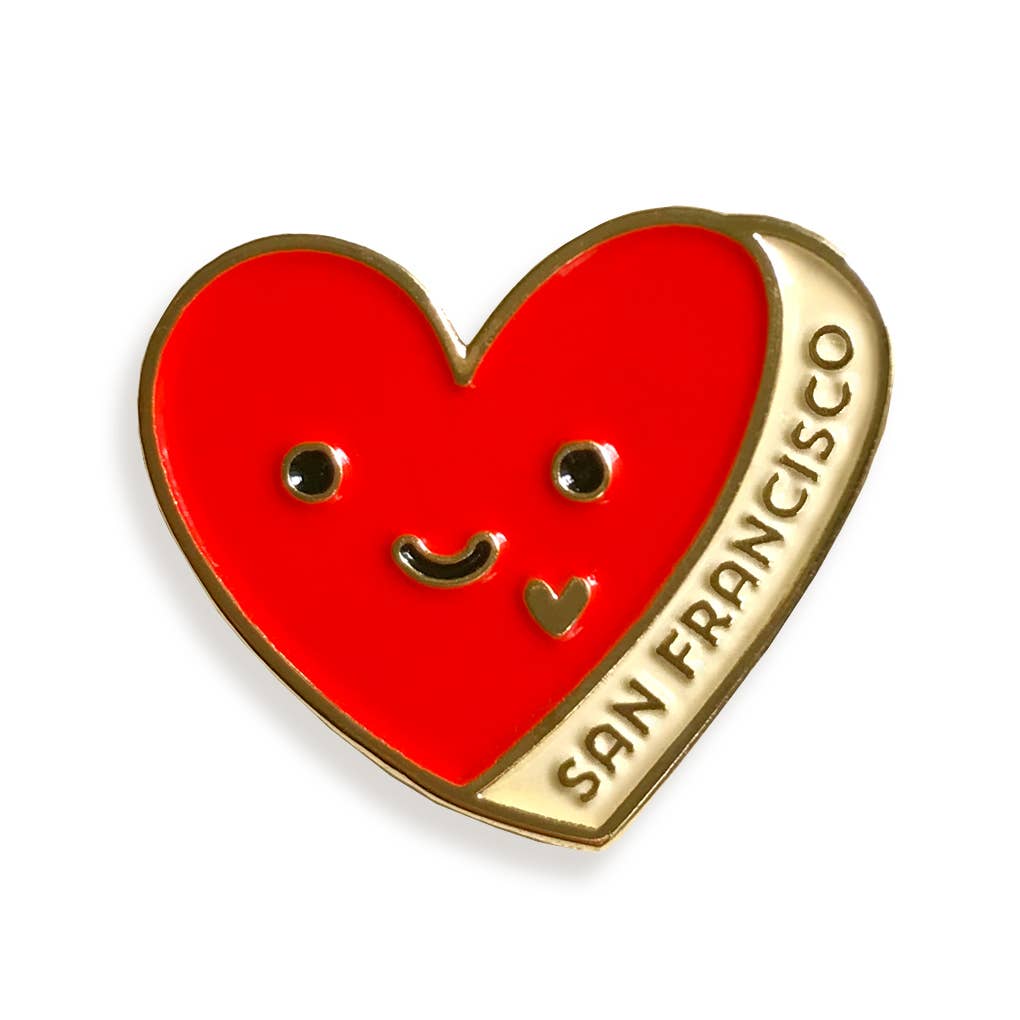 Red heart-shaped pin with gold border and 'San Francisco' text on a white background
