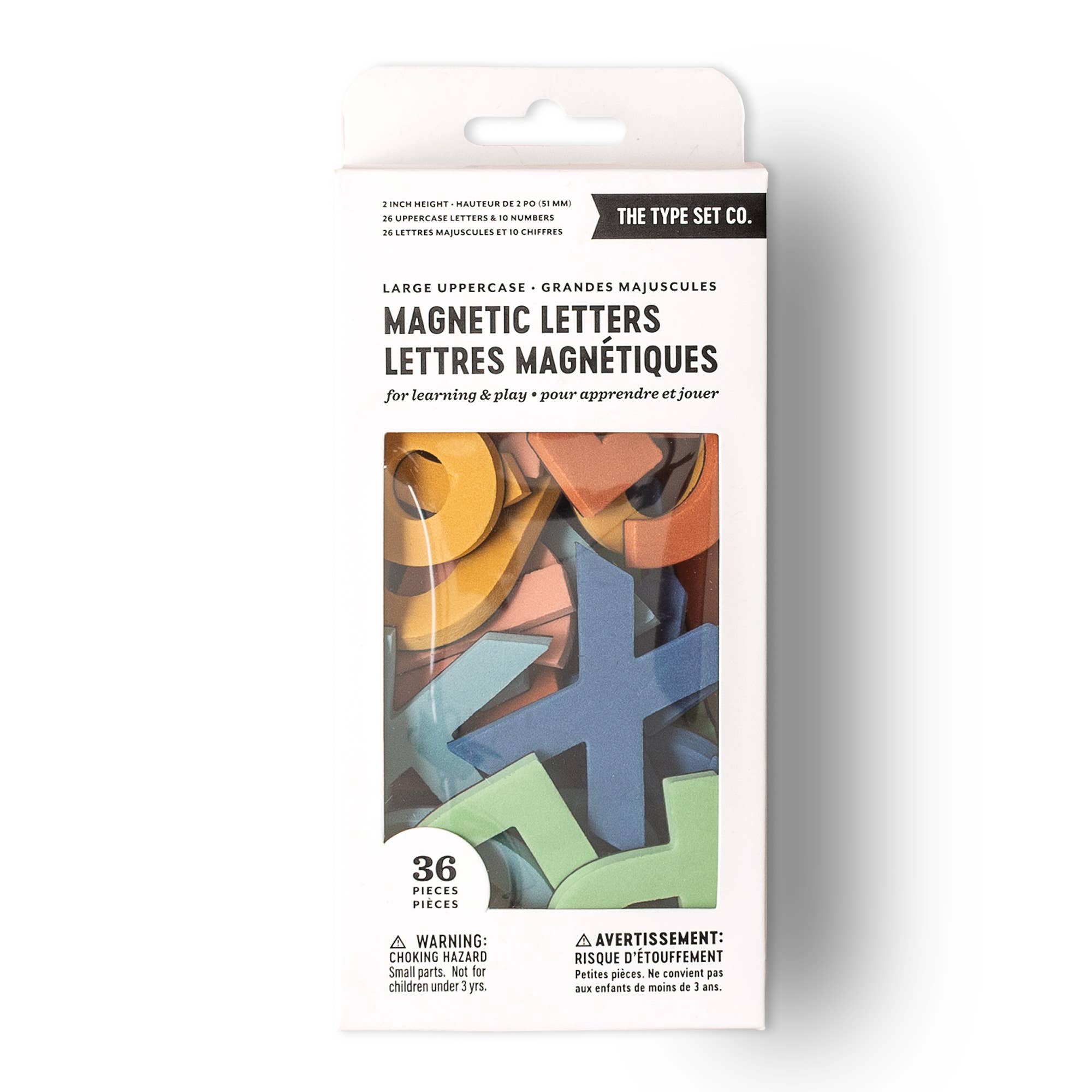 Packaging of magnetic letters with colorful letters on a white background