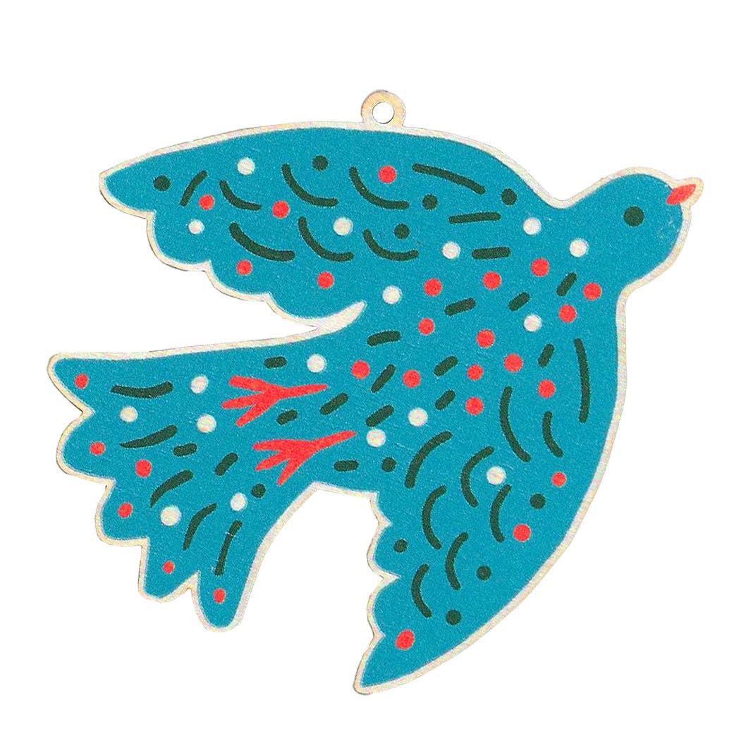 Decorative blue fish ornament with red and black patterns on a white background