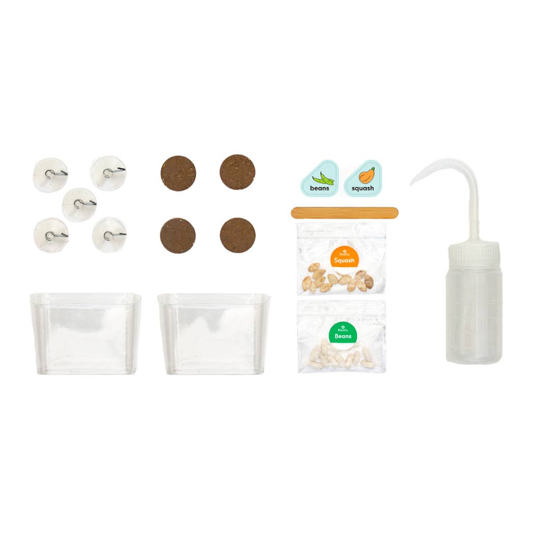 Set of reusable silicone food storage bags with labels on a white background