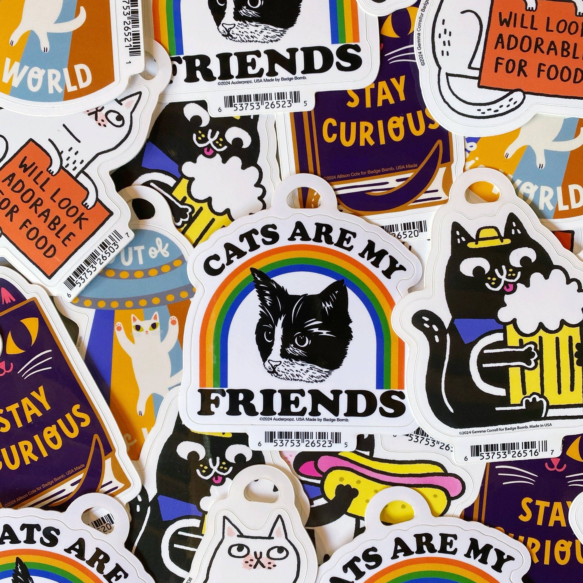 Collection of cat-themed stickers with various designs and text.