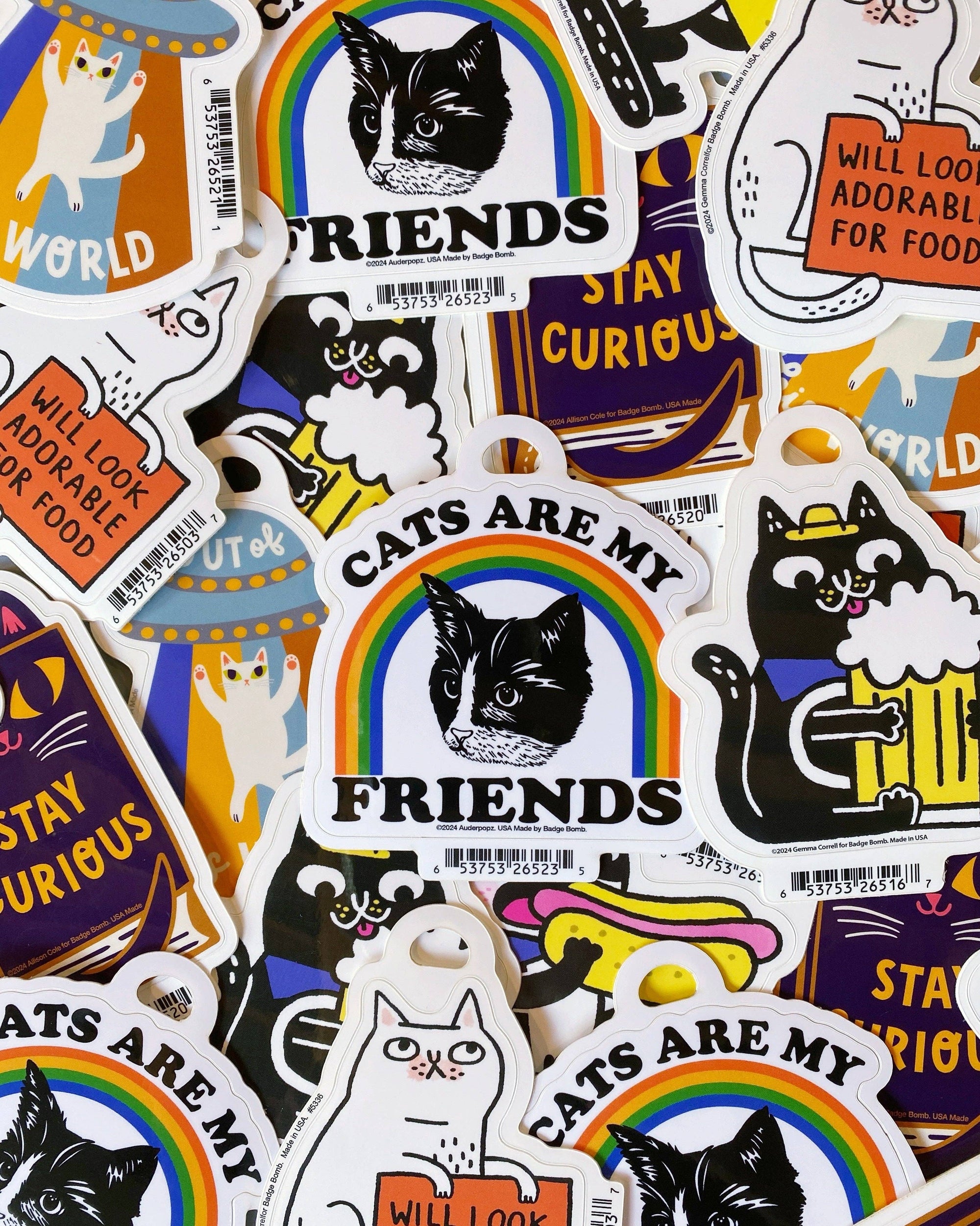 Collection of cat-themed stickers with various designs and text.