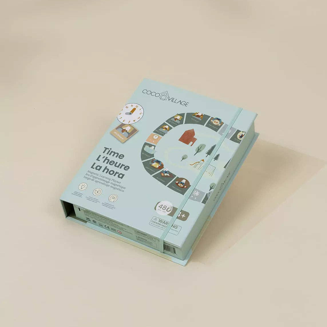 Children's educational clock book on a beige background