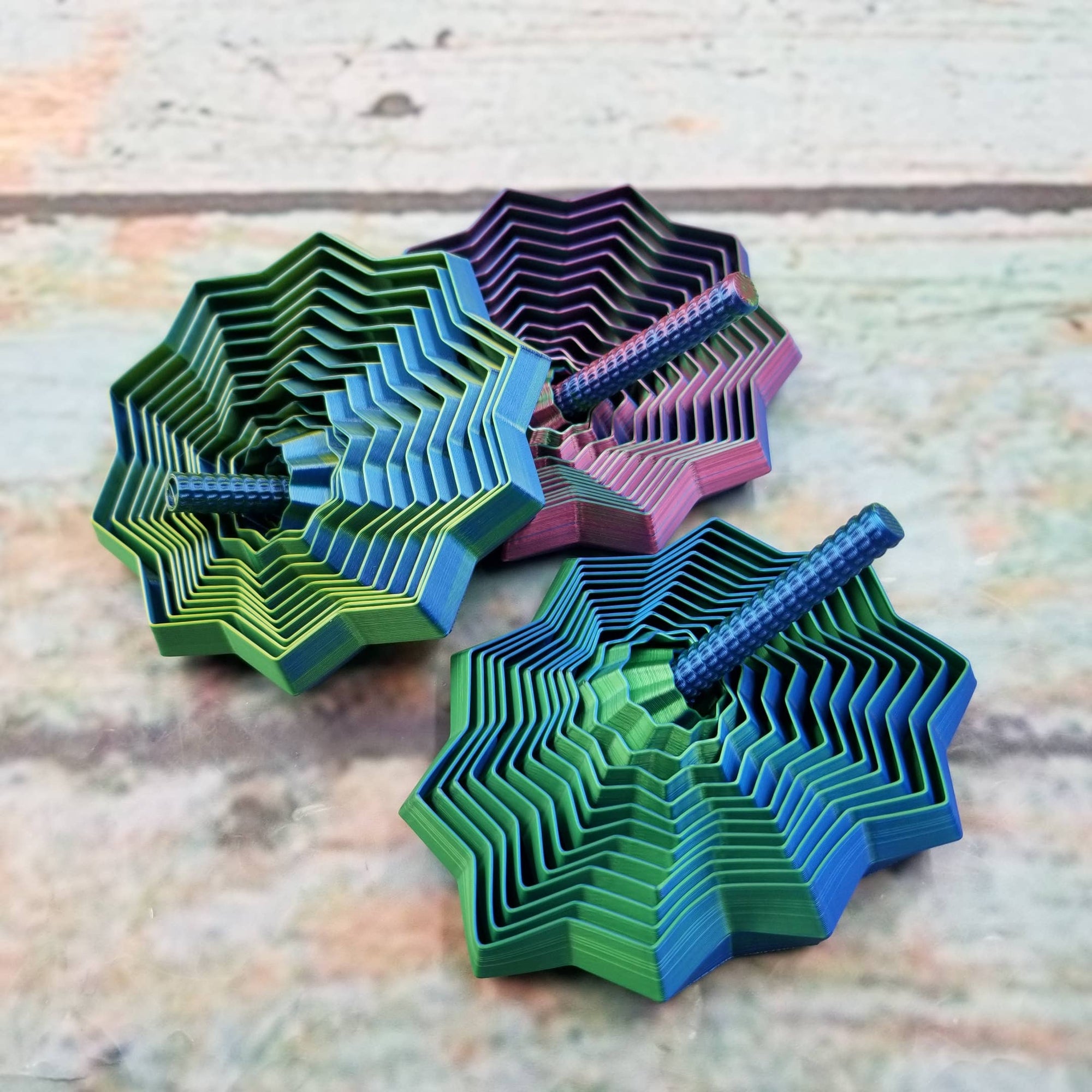 Colorful paper coasters arranged on a textured surface
