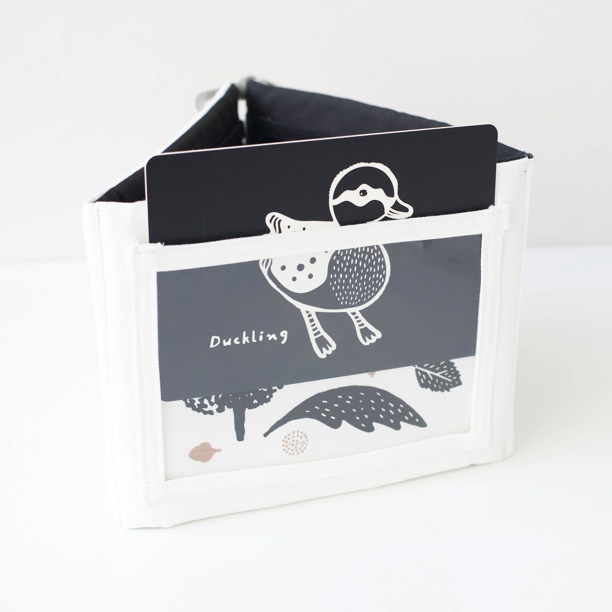 Children's book with a duck illustration on a white background