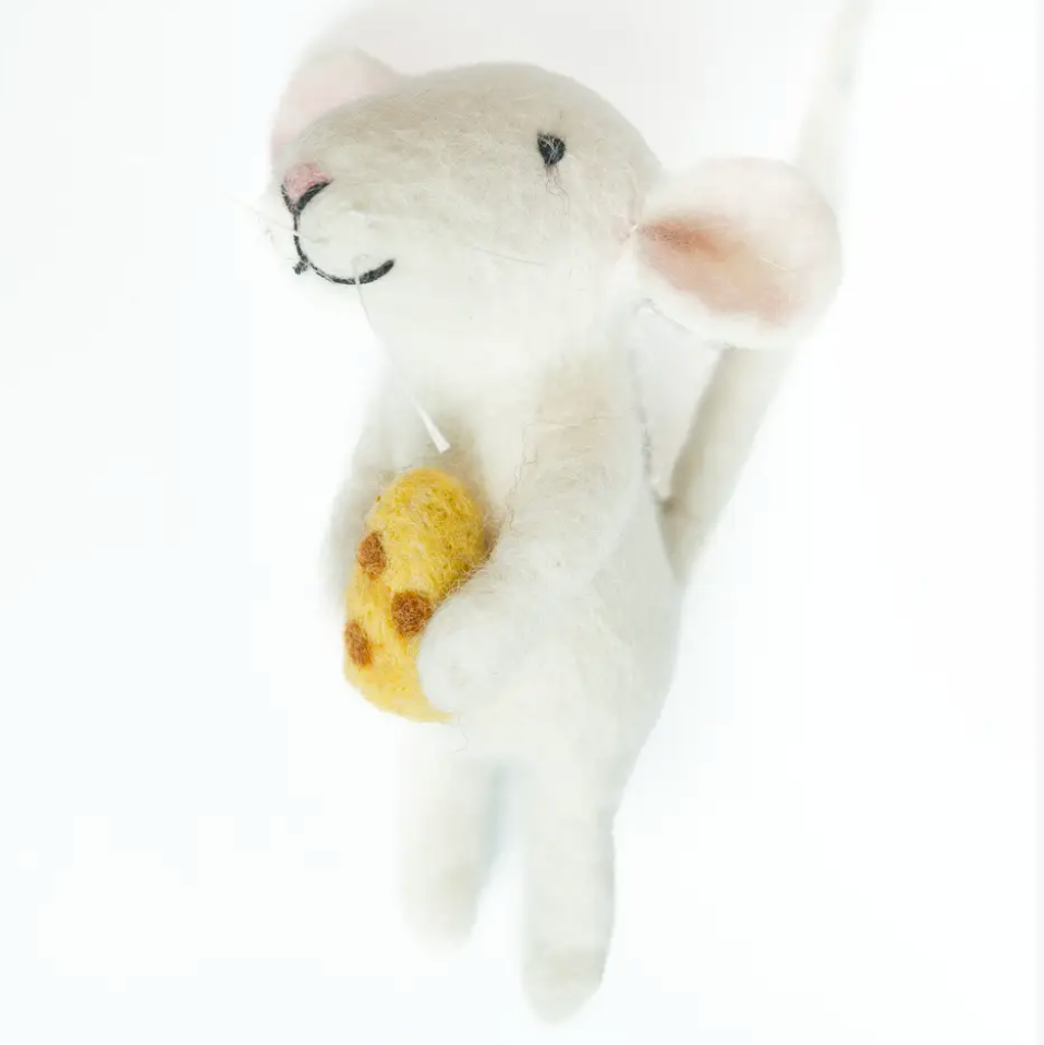 White plush mouse toy with a yellow heart on a white background