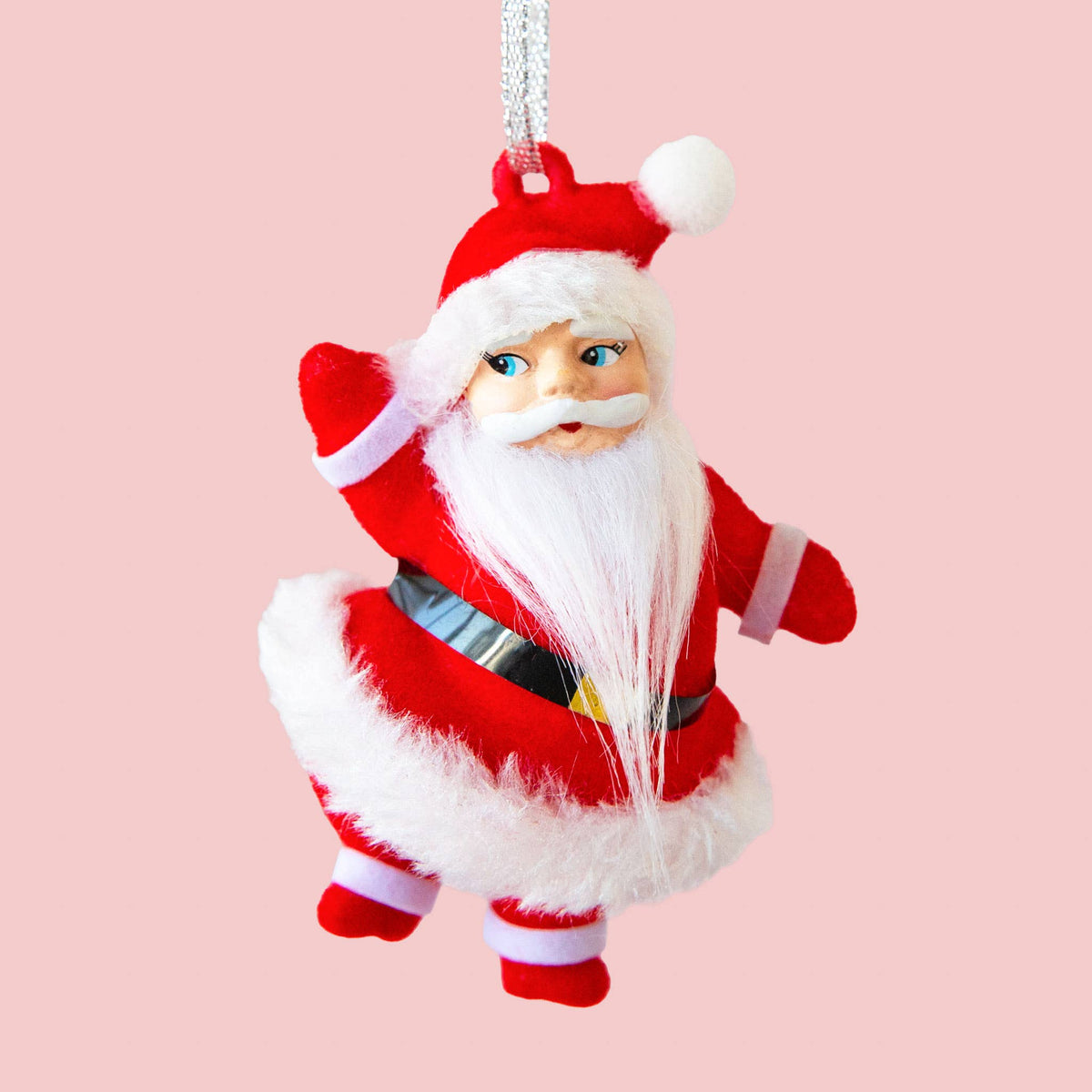 Decorative Santa Claus ornament on a pink background