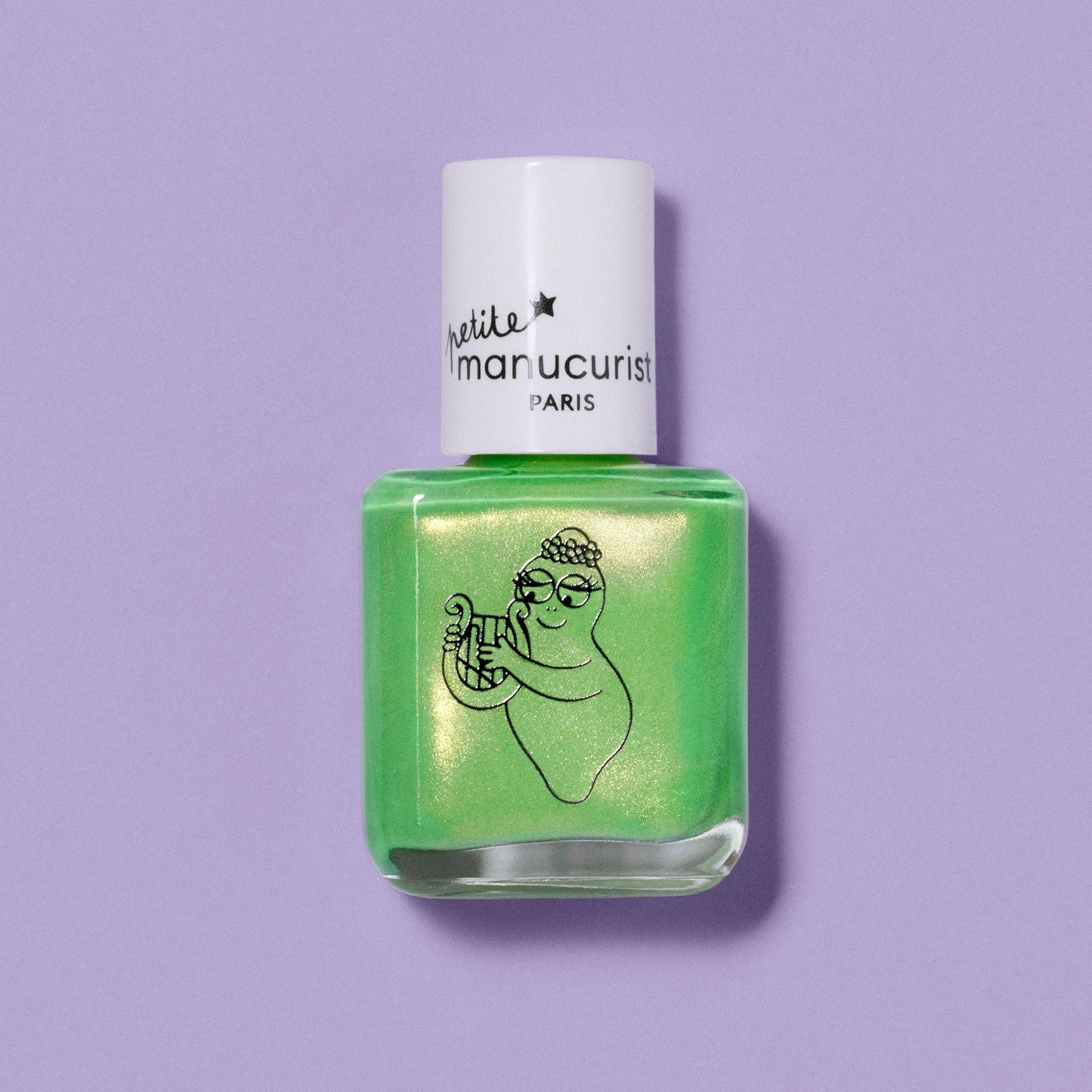 A bottle of nail polish in a bright, shimmery lime green shade, featuring a white cap with the brand name 'mimic manicurist PARIS' and a black line-art illustration of a ghost holding a phone. The bottle is centered on a solid lavender-purple background.