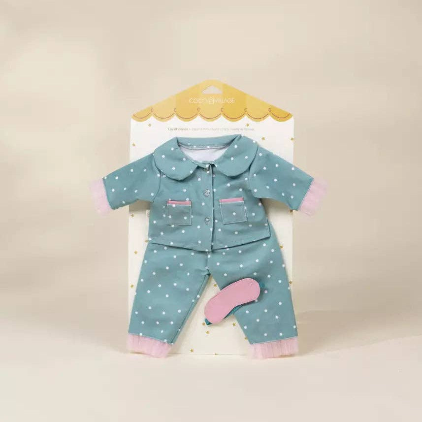 doll pajama set with polka dot pattern on a beige background