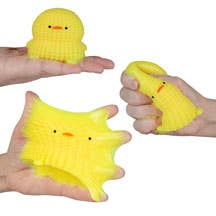 Yellow duck-shaped stress balls held by hands against a neutral background
