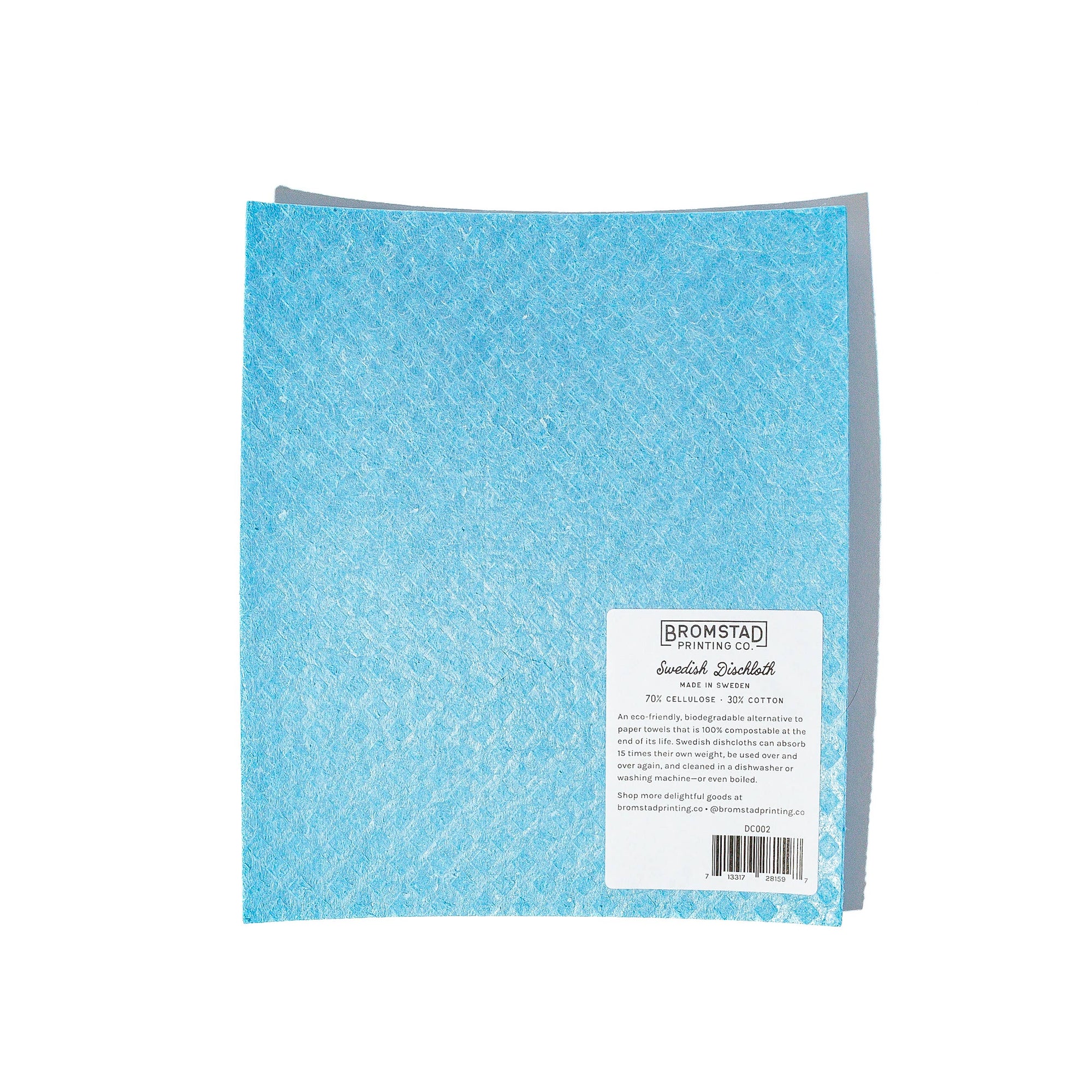 sponge with a pattern on the cover and a label on the back on a white background