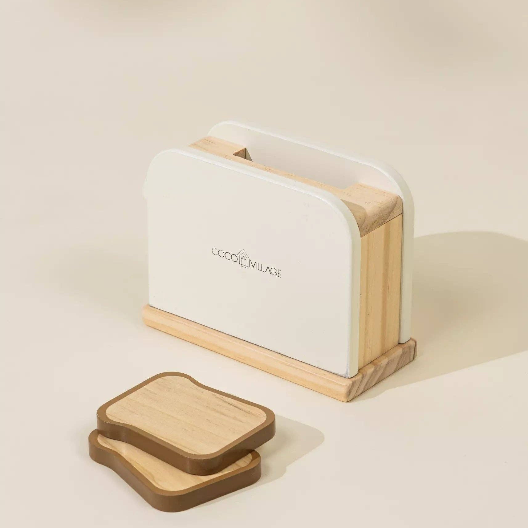 White toaster with wooden accents on a beige background