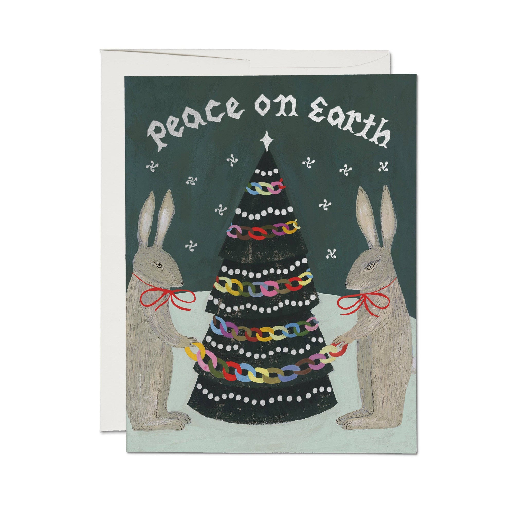 Greeting card with two rabbits holding a decorated Christmas tree and 'Peace on Earth' text.