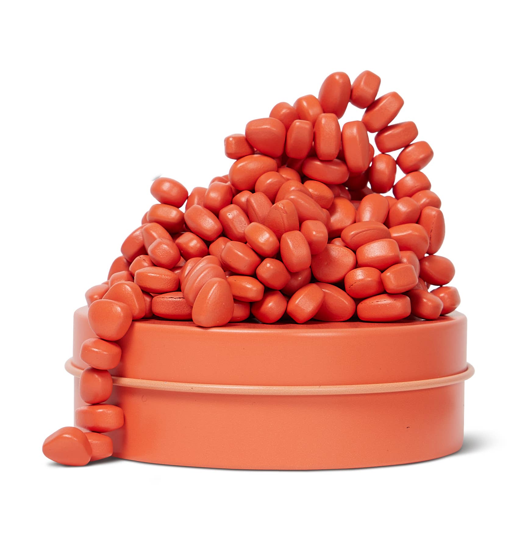 Coral-colored container with coral magnets