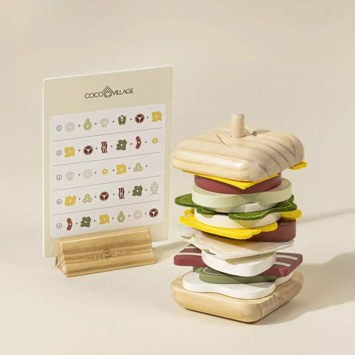 Wooden toy hamburger with a menu card on a beige background