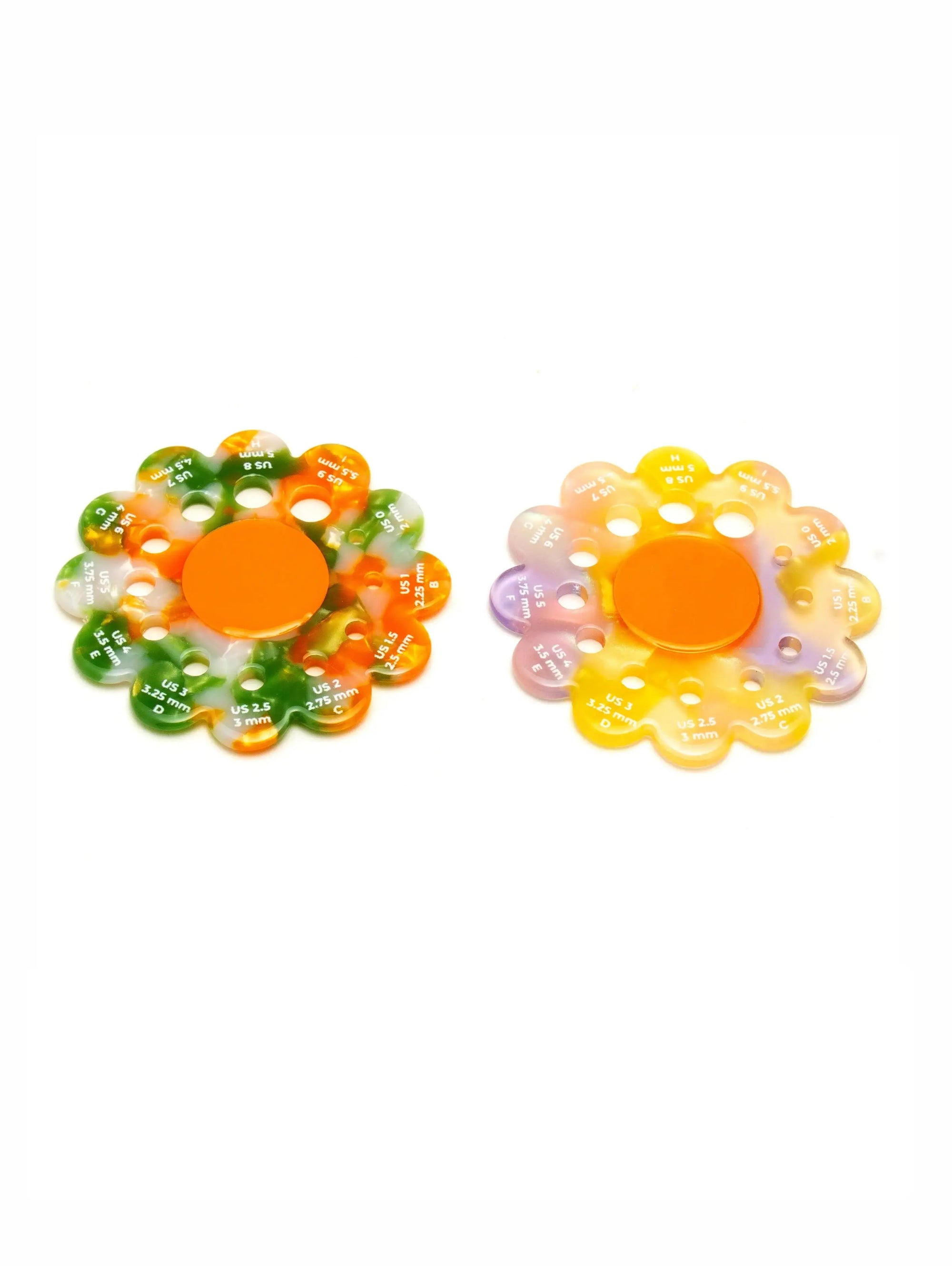 Two colorful flower-shaped objects on a white background