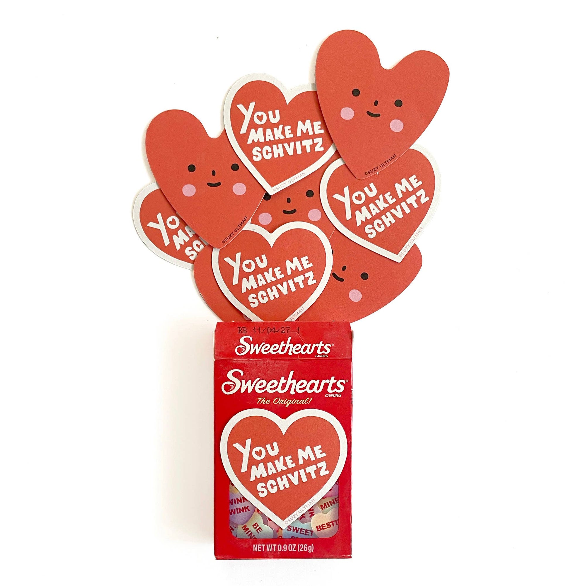 Red 'Sweethearts' candy box with heart-shaped characters on a white background