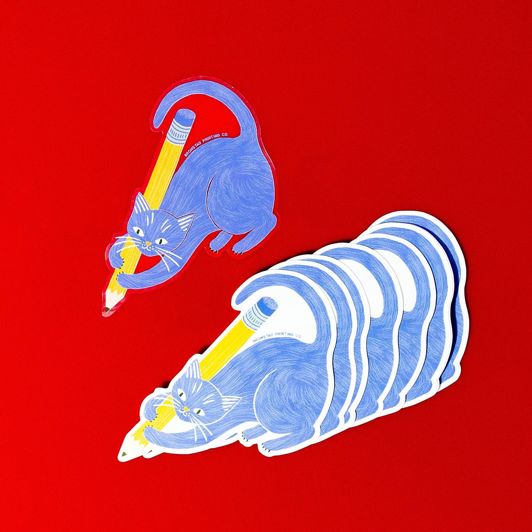 Two blue cats with yellow tails on a red background