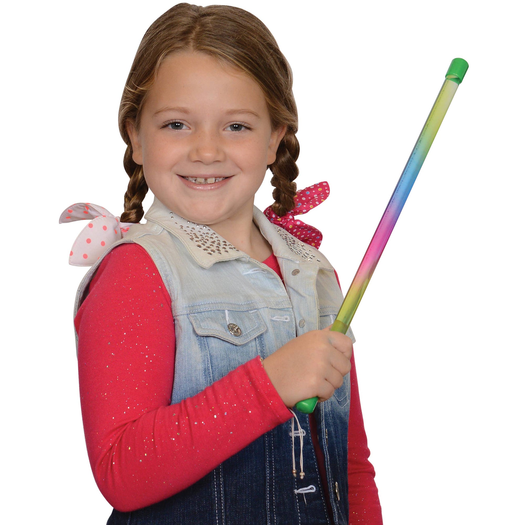Young girl holding a colorful broom on a white background