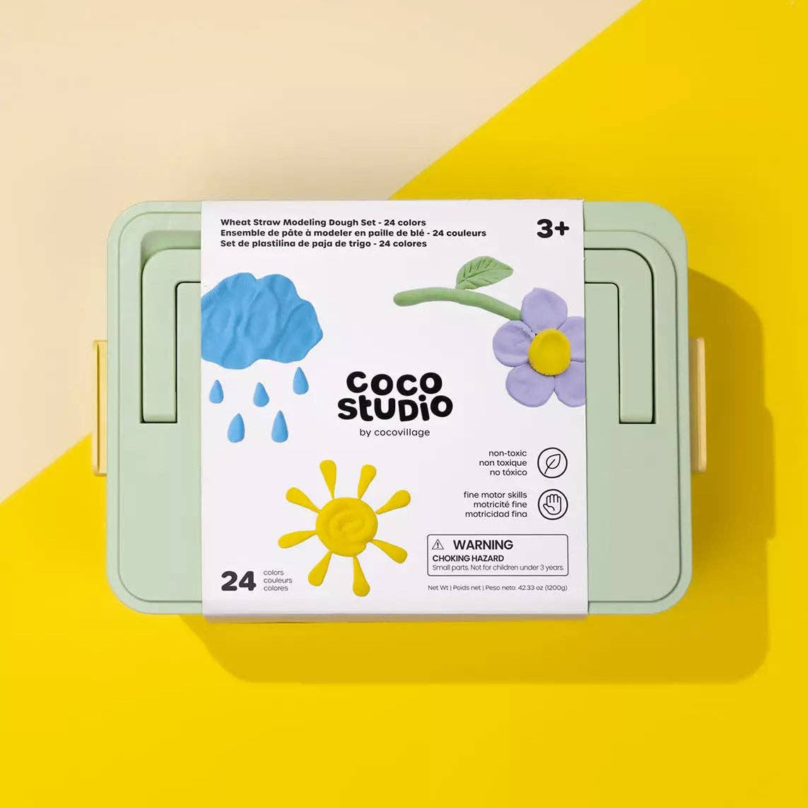 Coco Studio packaging on a yellow and beige background