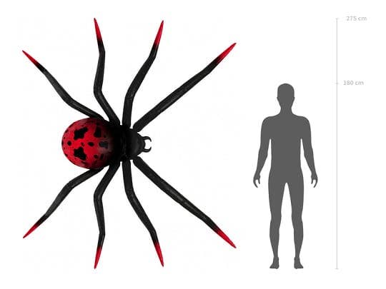 A large spider-shaped product shown next to a human silhouette for scale, with height markings of 275 cm and 180 cm on a white background.
