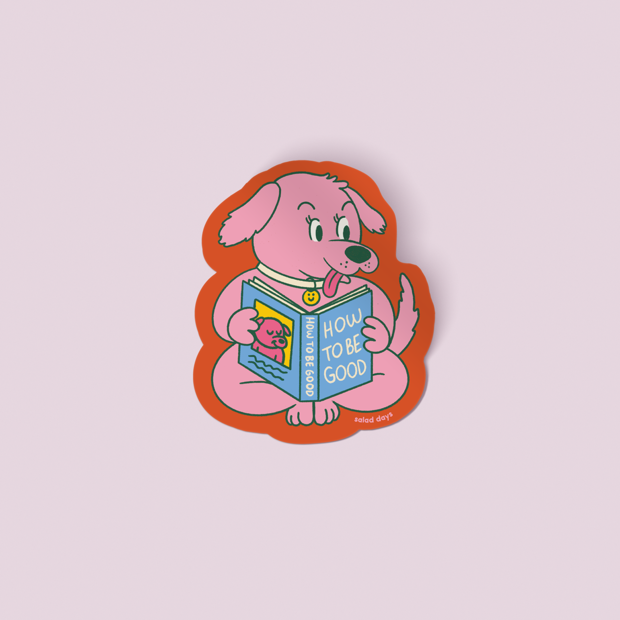 Sticker of a pink dog holding a book titled 'How to be Good' on a light purple background