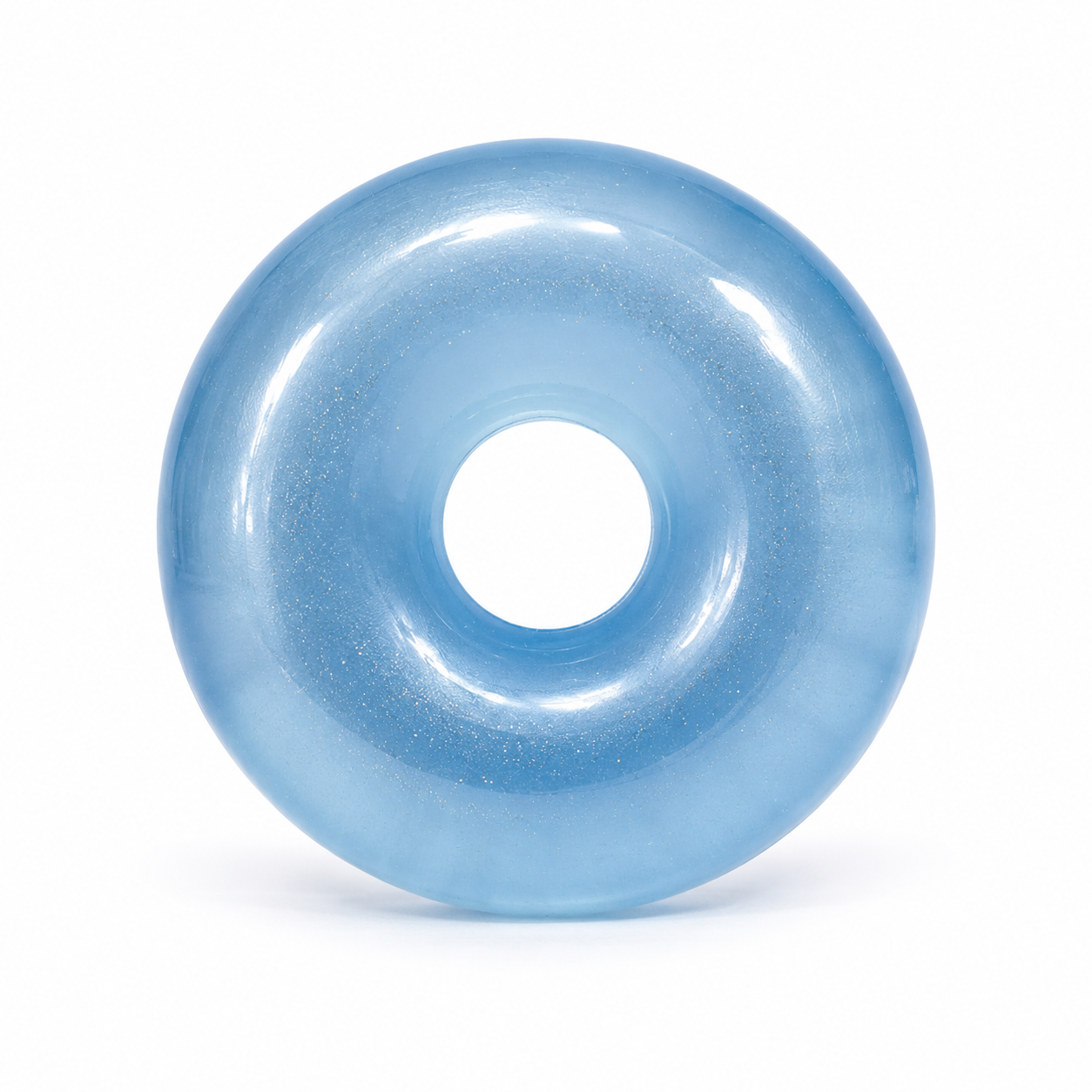 Blue donut-shaped object on a white background