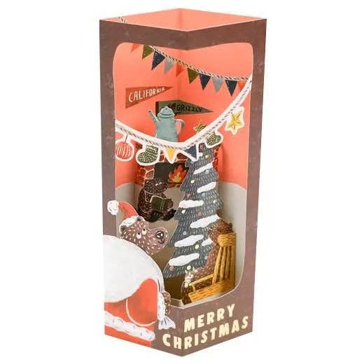 Christmas-themed decorative box card with festive illustrations and 'Merry Christmas' text.