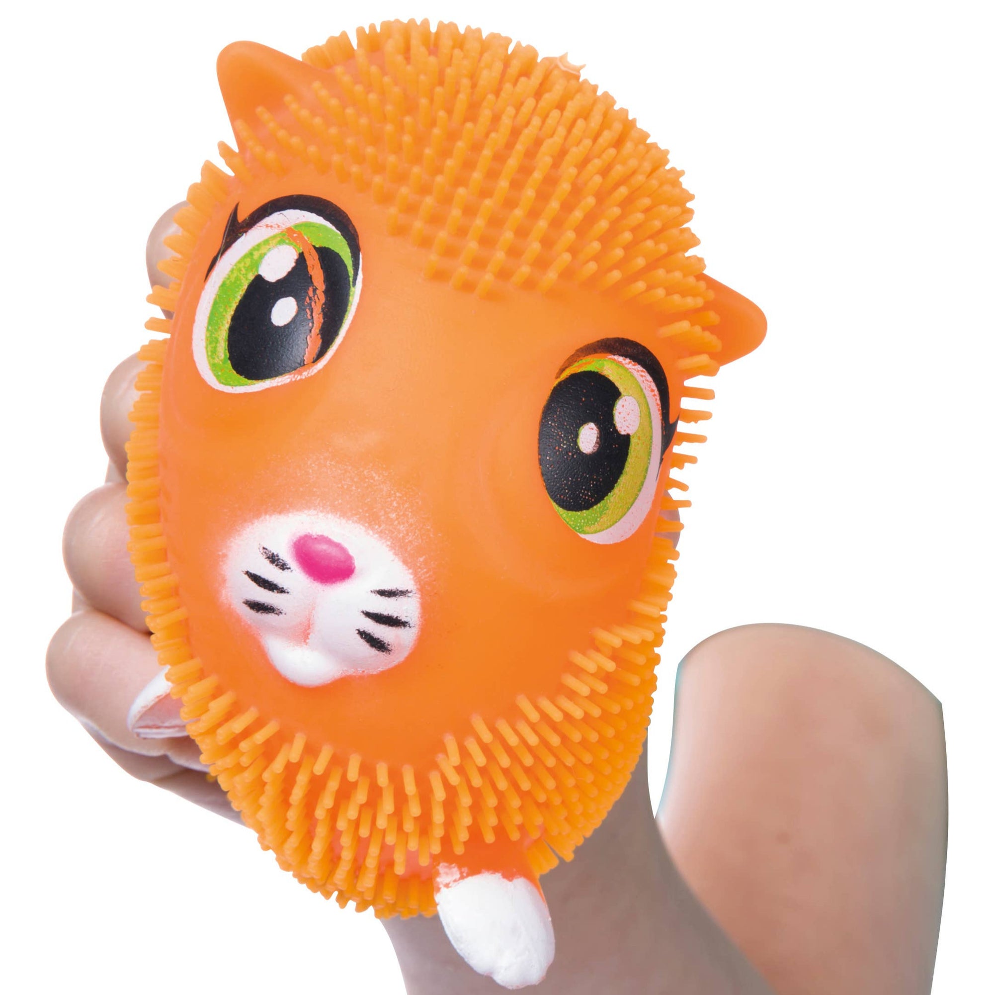 Orange cat-shaped stress ball held in a hand on a white background