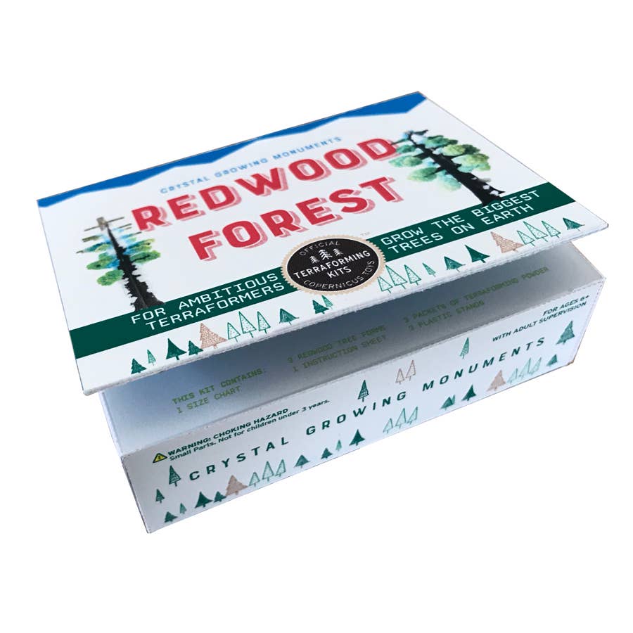 Box for 'Redwood Forest' crystal growing kit with tree graphics and text.