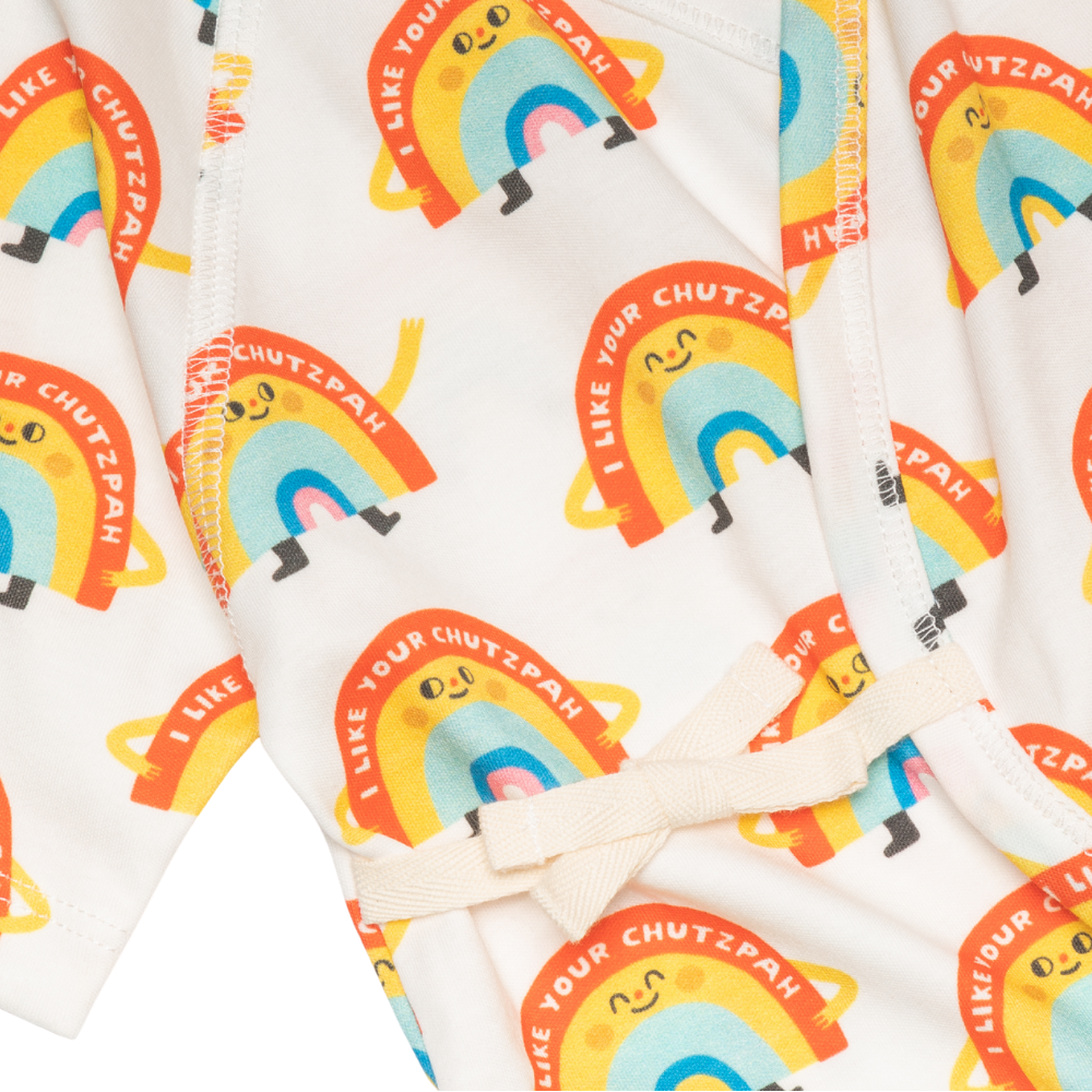 Pack of dodo banana snack packs with rainbow and animal designs on a white background