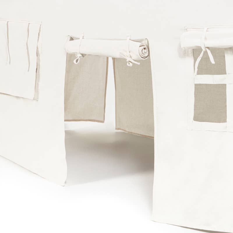 Set of beige tent hanging on a white background