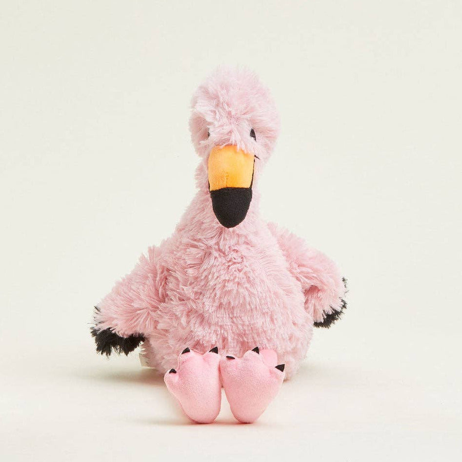 Pink plush flamingo toy on a white background