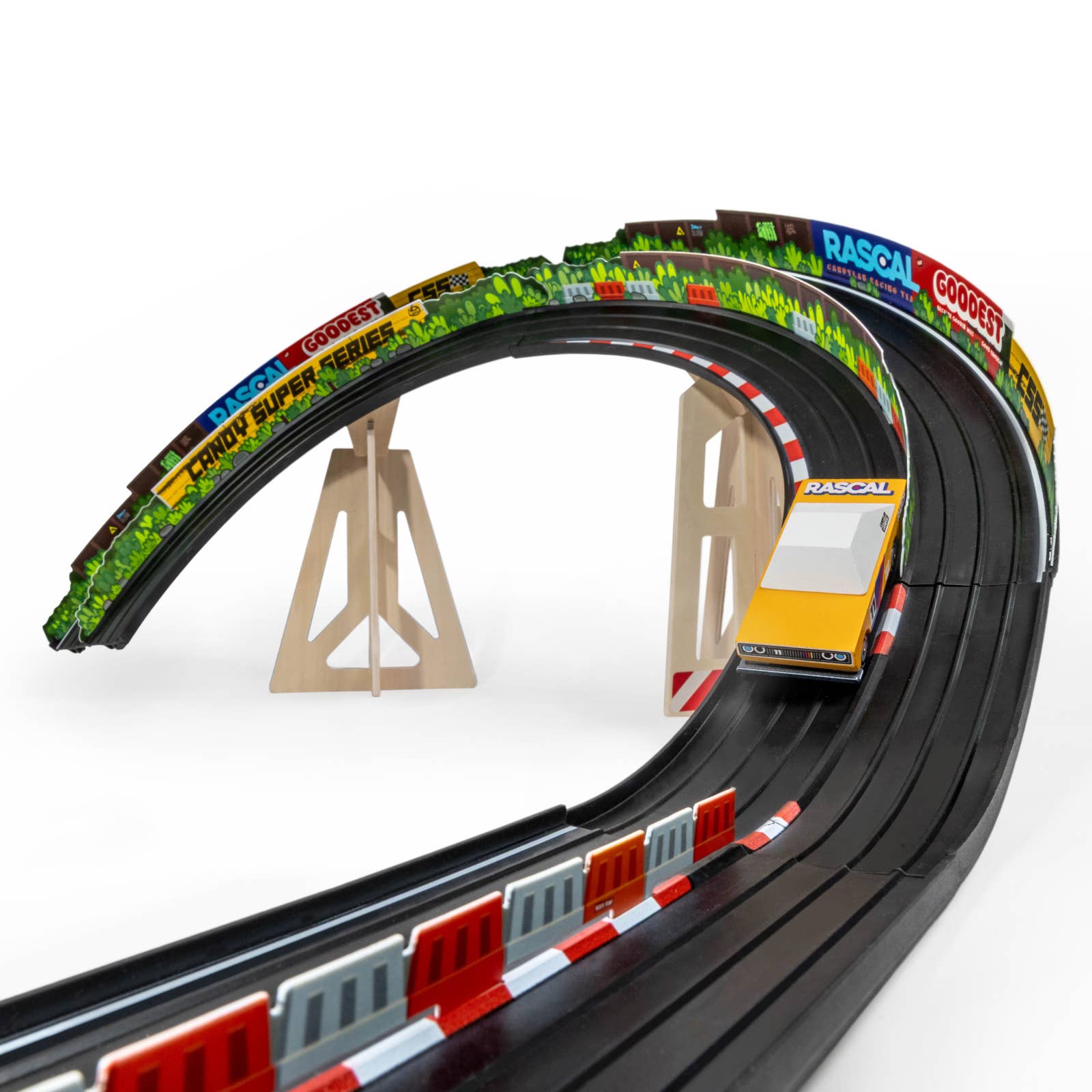 Toy race track set with cars on a white background