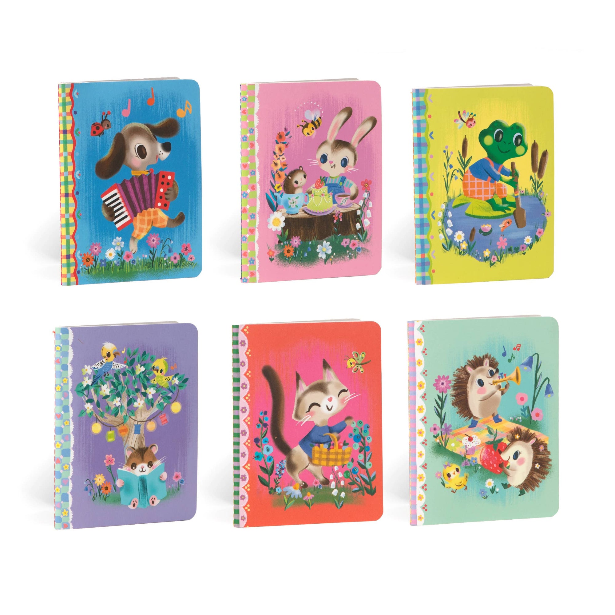 Set of six colorful children's notebooks with animal illustrations on a white background