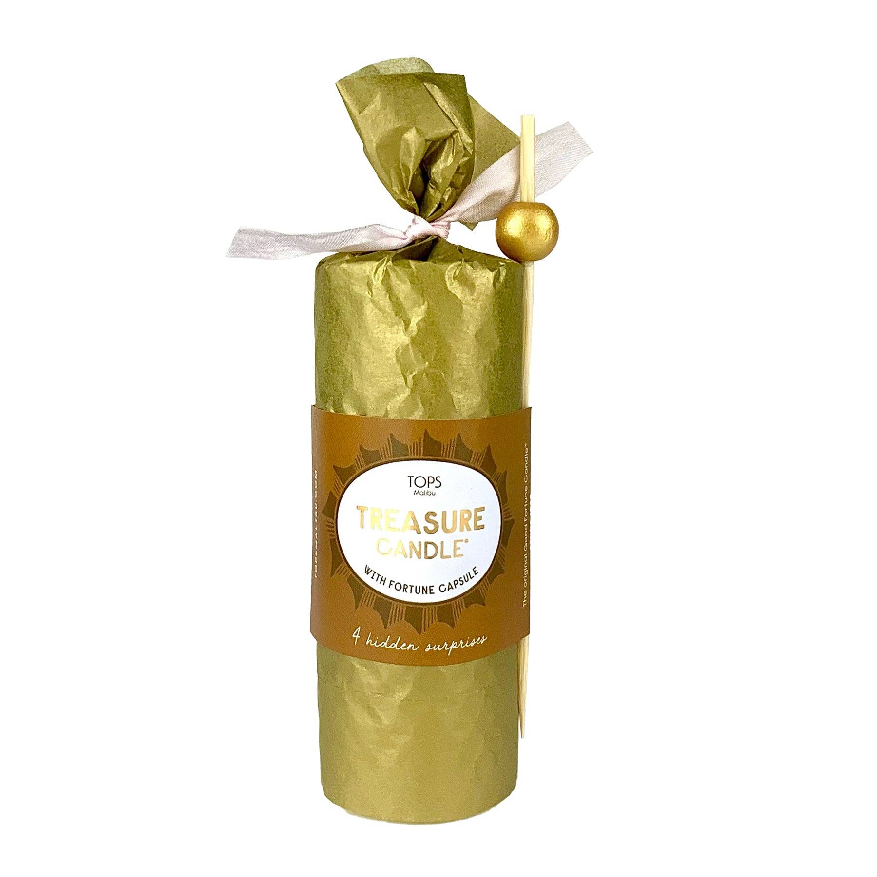 Gold-wrapped candle with a white label on a white background