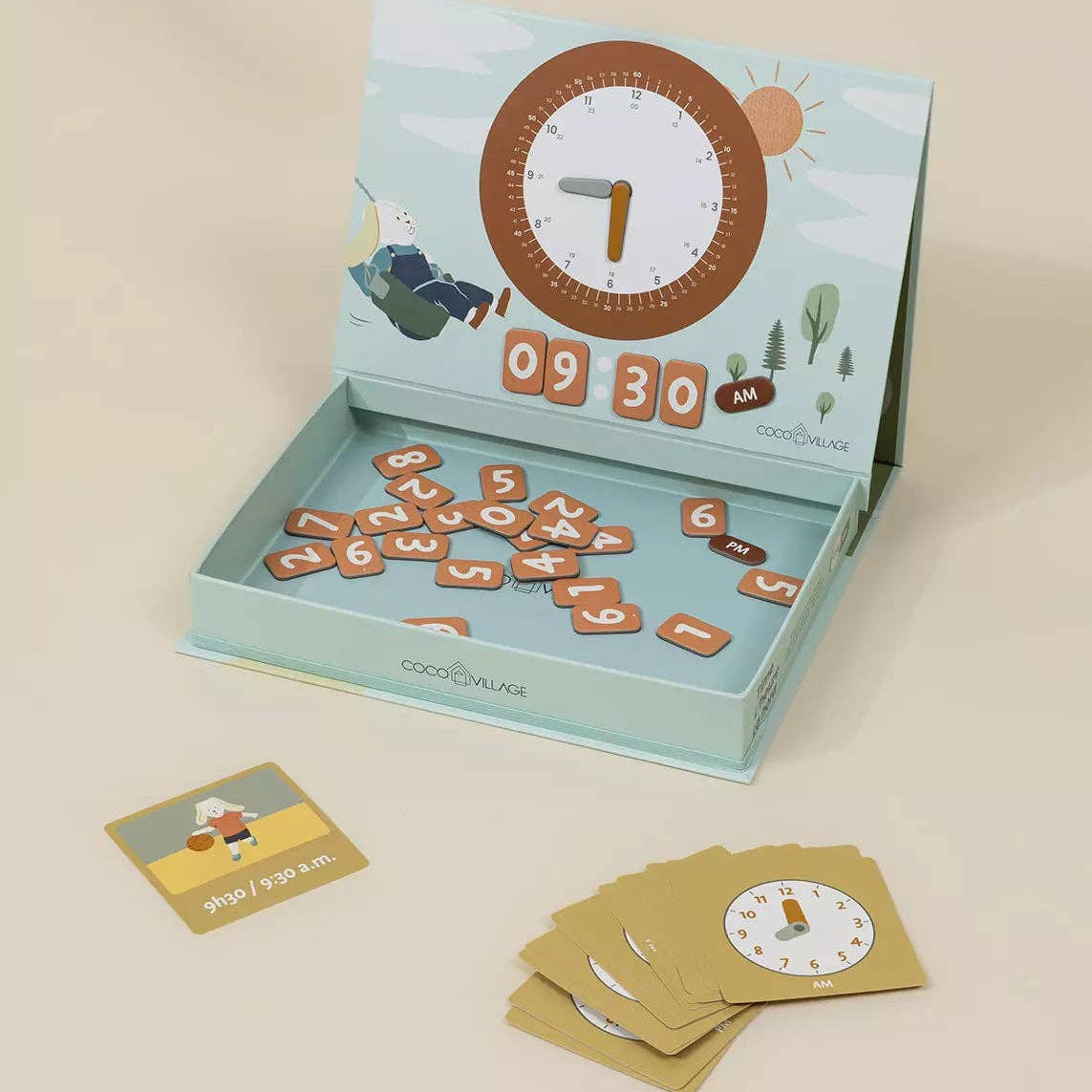 Educational game with cards and a clock-themed box on a beige background