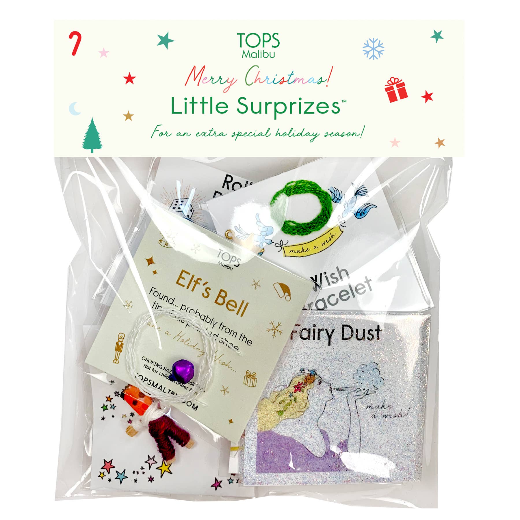 Packaged toy set with 'Elf's Bell', 'Wish Bracelet', and 'Fairy Dust' from TOPS Malibu, featuring Christmas-themed packaging.