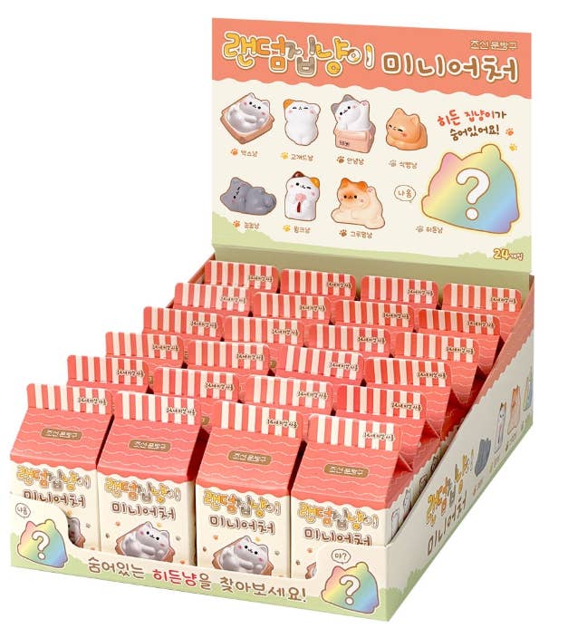 Display of small packages with cartoon cat designs on a white background