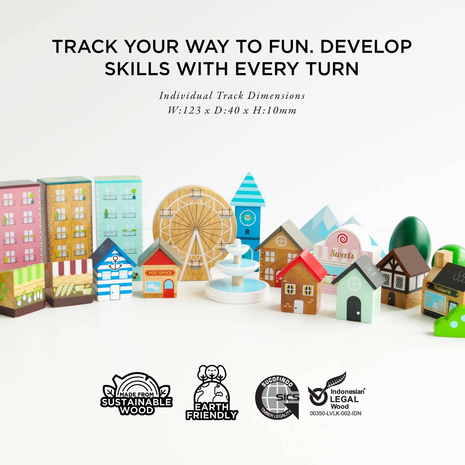 Model town set with miniature buildings and attractions on a white background, featuring sustainability and eco-friendly logos.