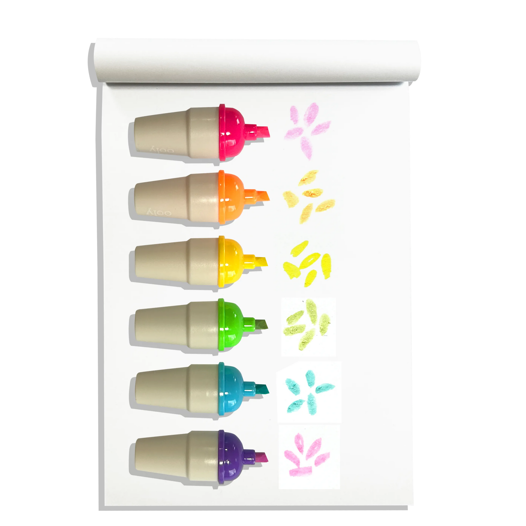 Set of six colorful highlighters with sample marks on a white background