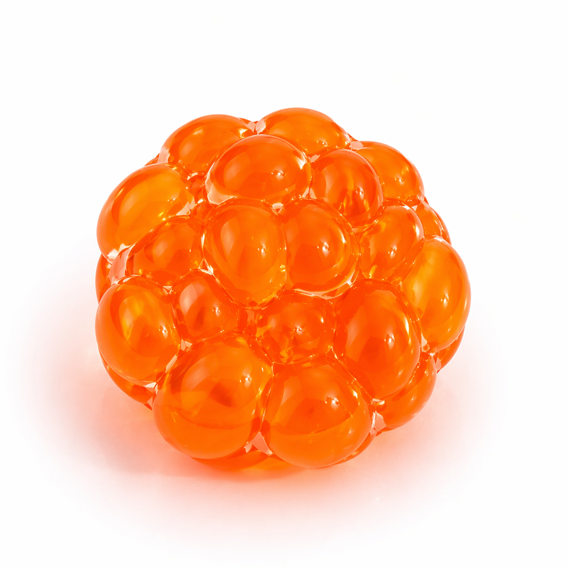 Orange gel ball with a textured surface on a white background