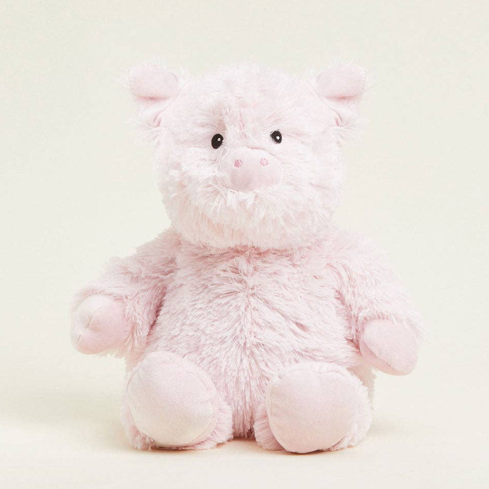 Pink plush toy on a light beige background
