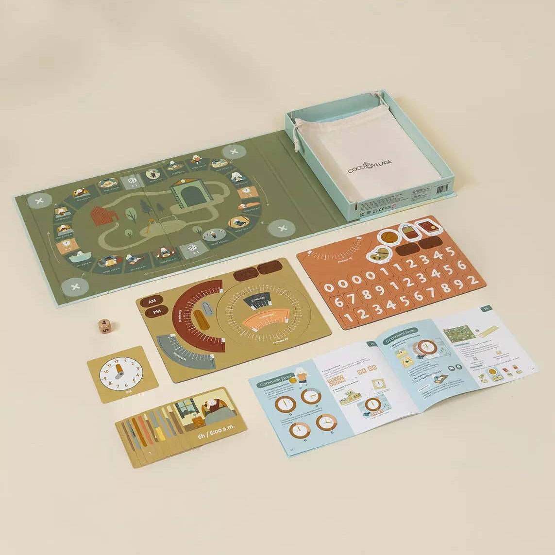 Educational children's play mat with cards and a box on a beige background