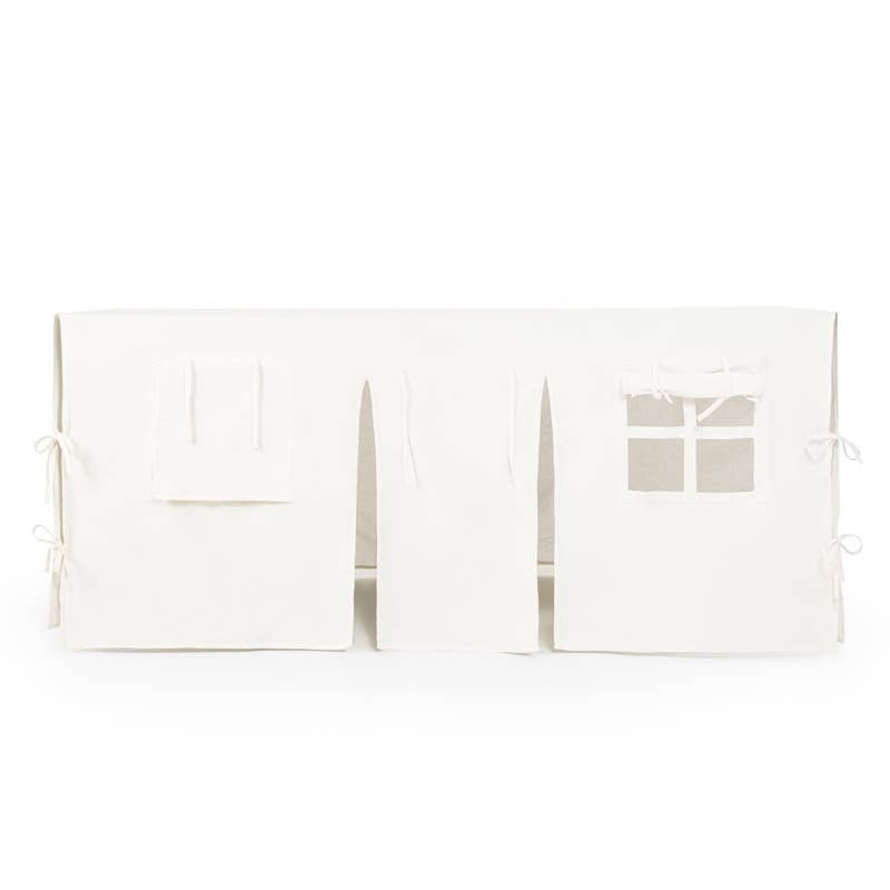 White fabric with cut-out patterns on a white background