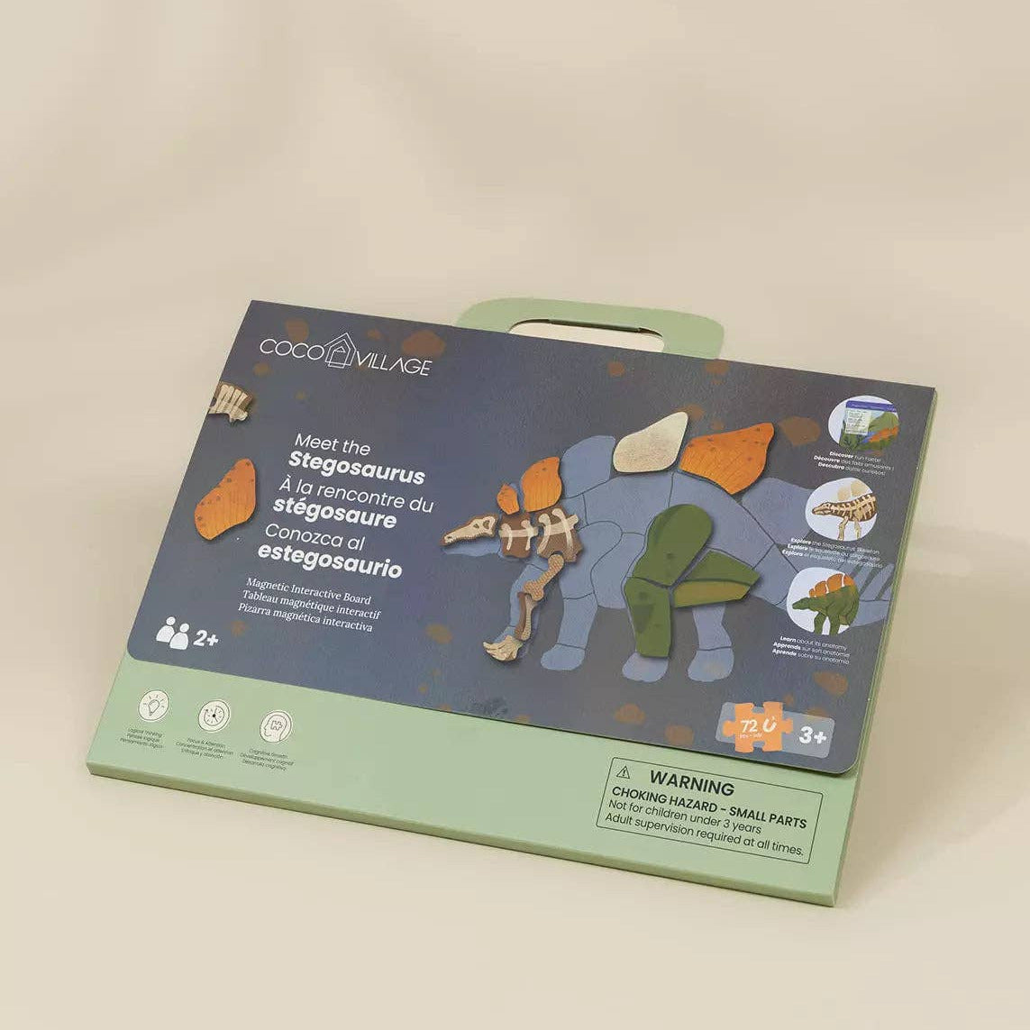 dinosaur toy set packaging on a beige background